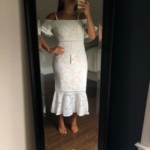 White/cream lace dress. Never worn. Tags still attached. Size:4